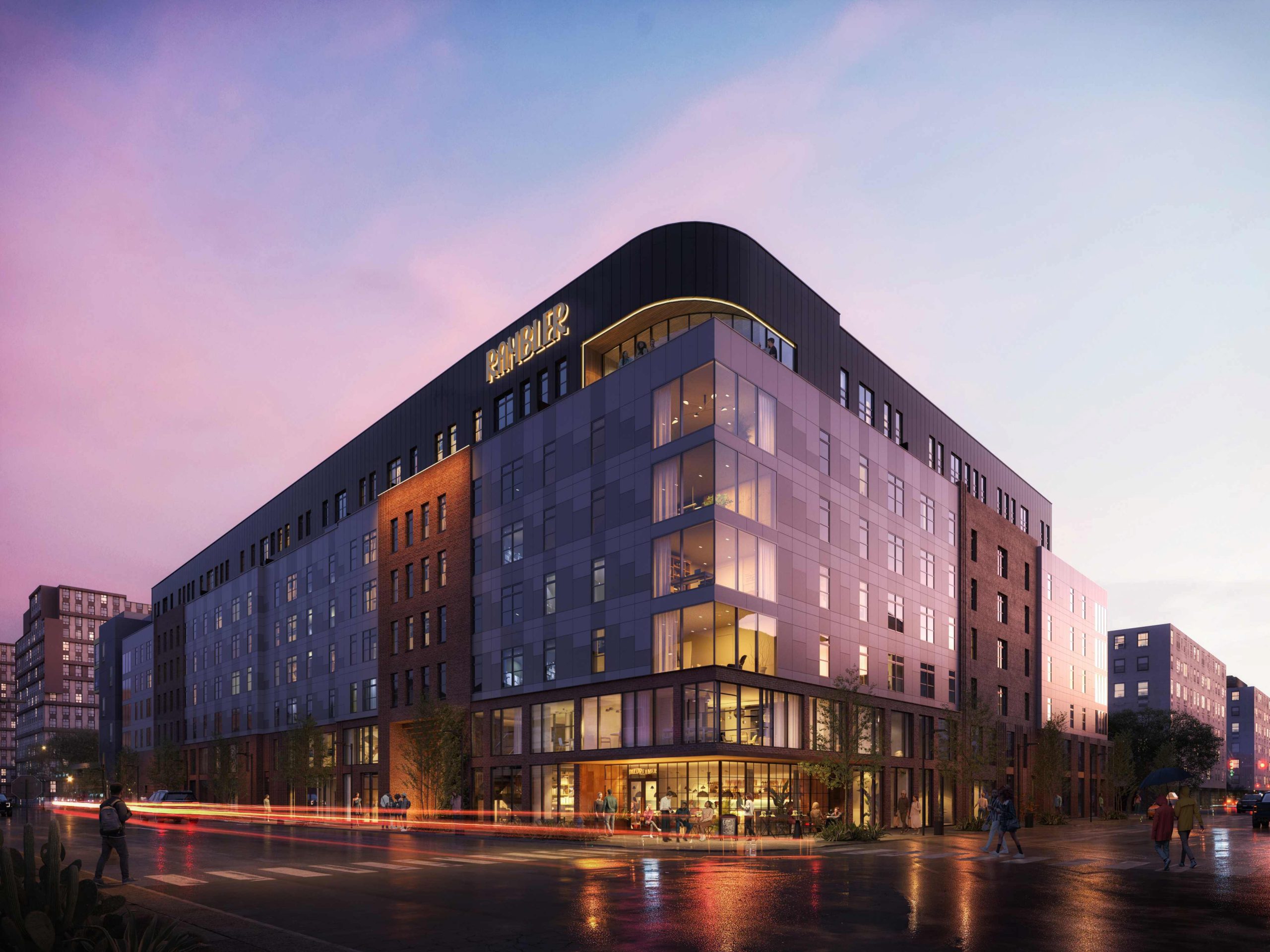 Exterior rendering of student housing apartment, Rambler, in West Campus at night time.