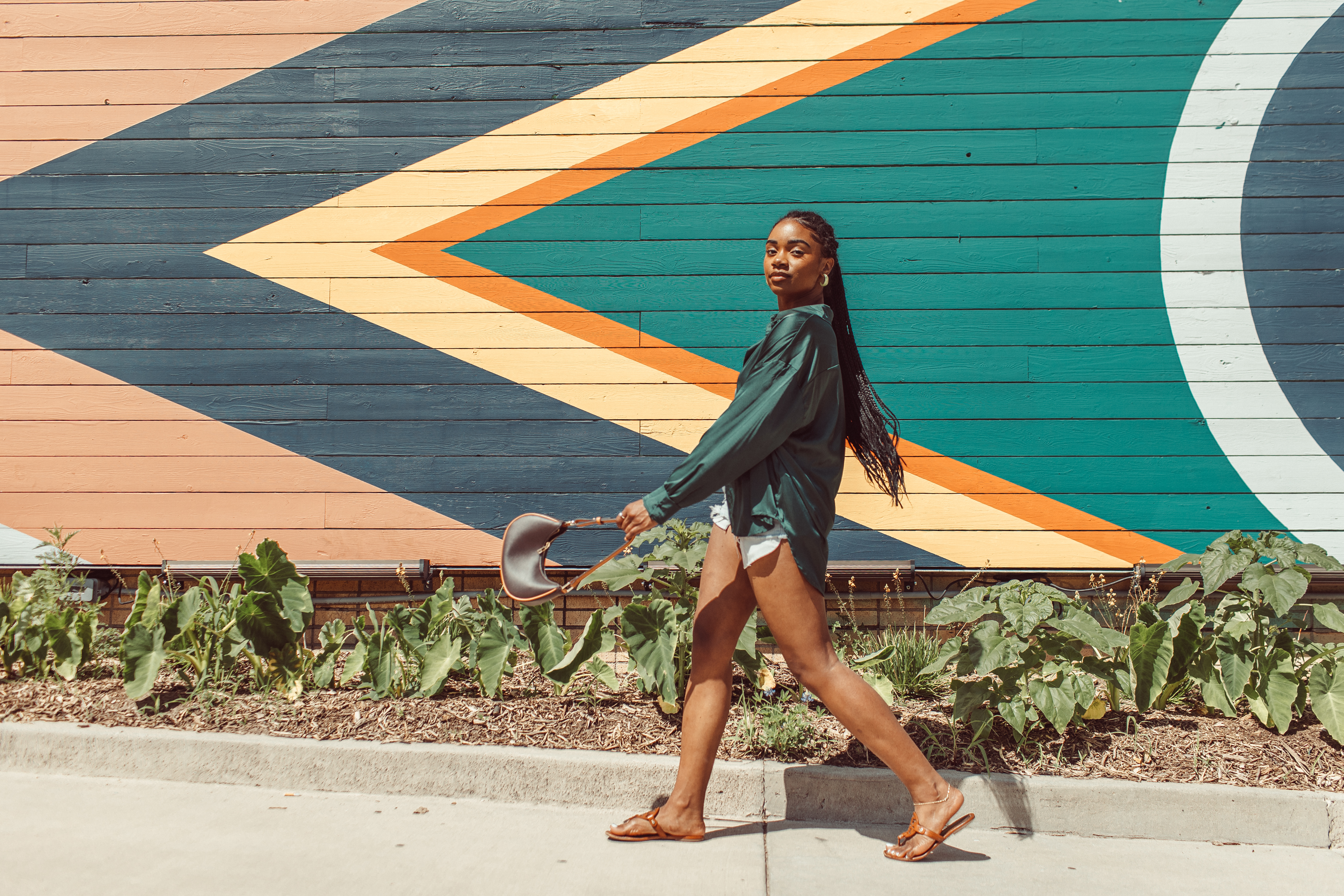 krystal walking down sidewalk