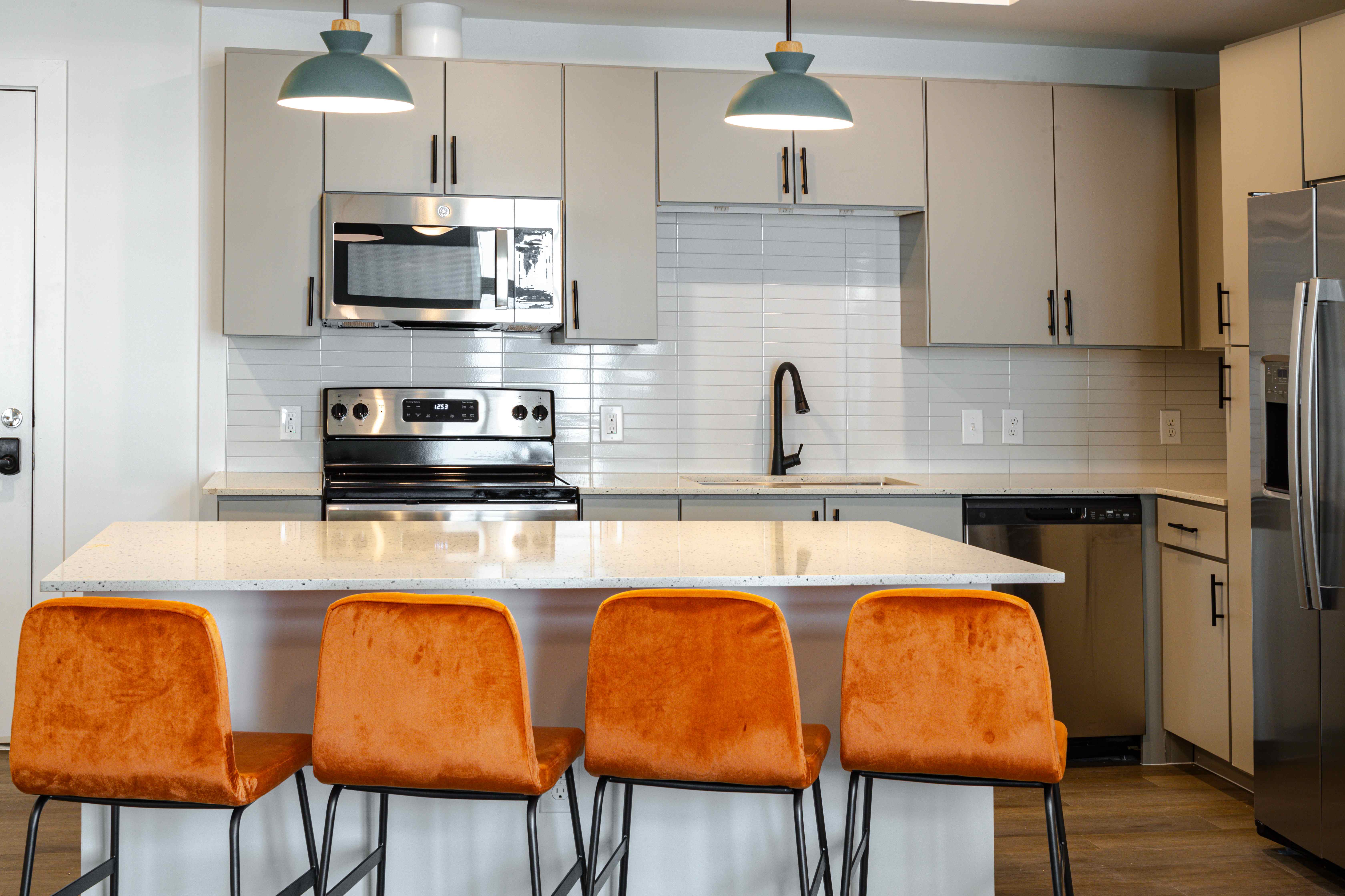 kitchen island and barstools at Rambler austin