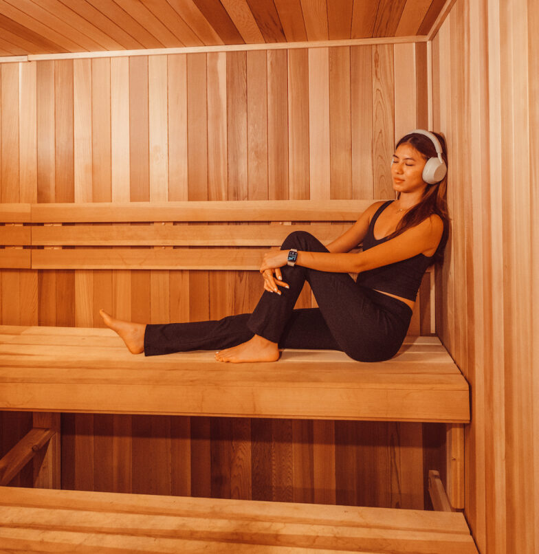 Girl relaxing in sauna at Rambler ATX