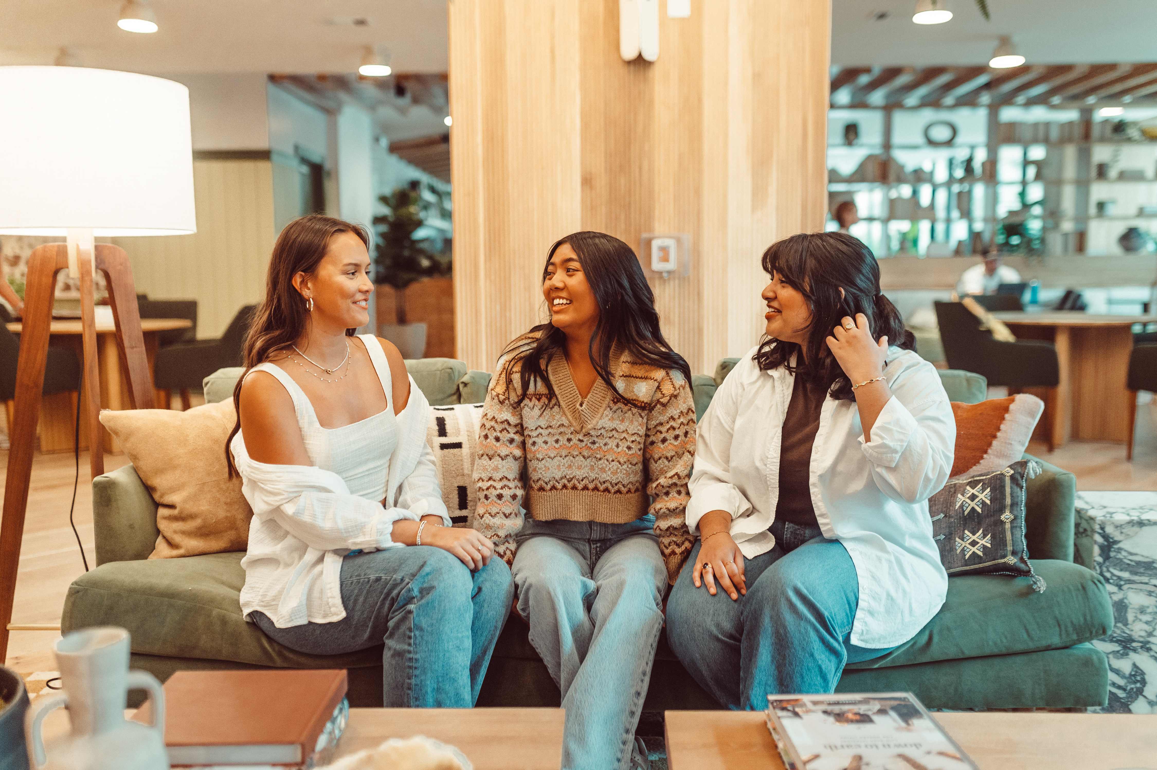 3 girls on couch at Rambler Austin