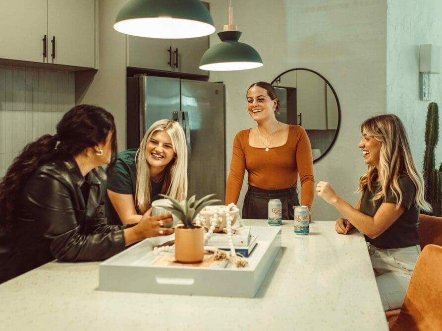 4 UT girls at Rambler ATX kitchen